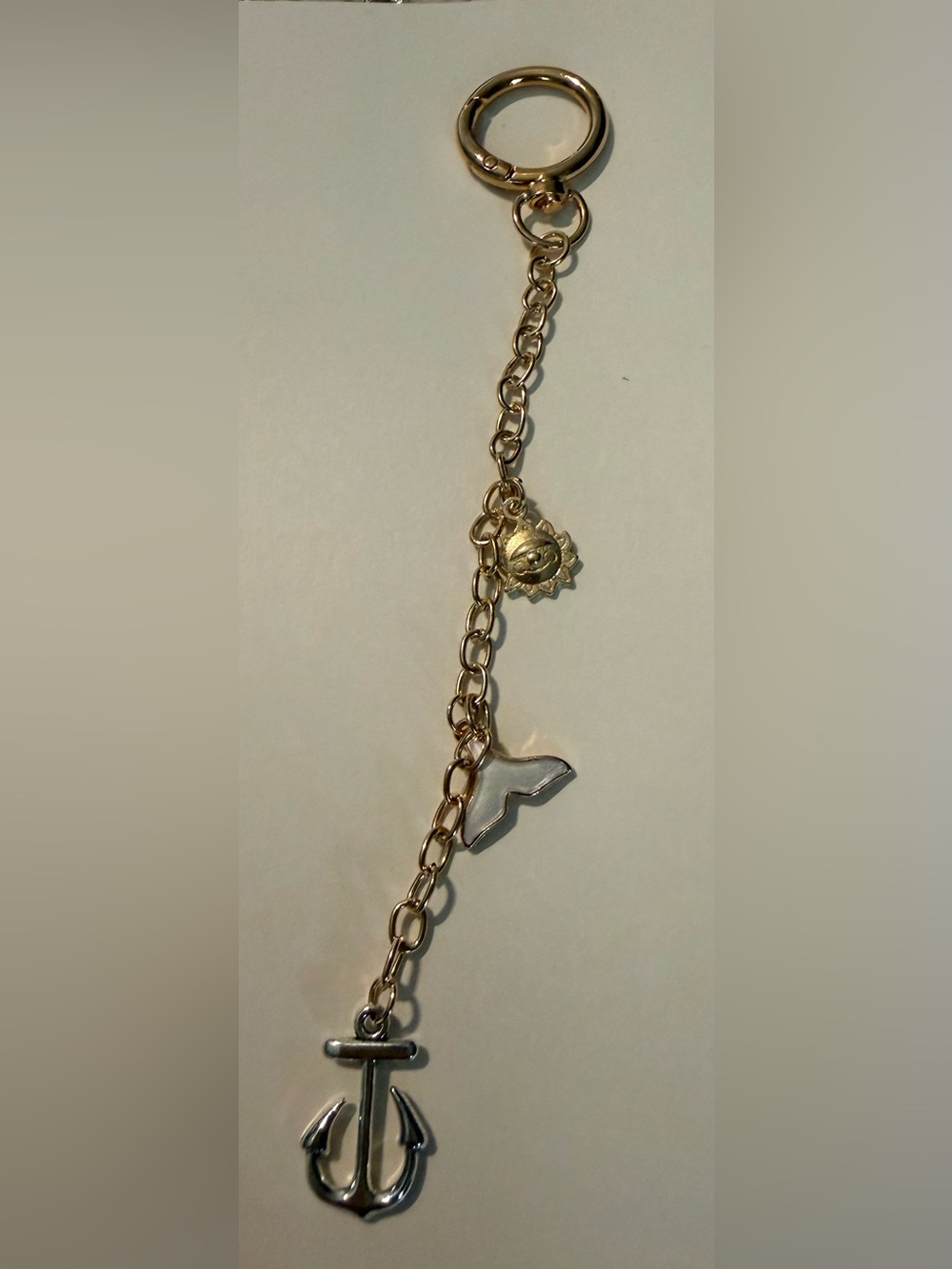 Gold Charm with Sun and Whale Tail Charms